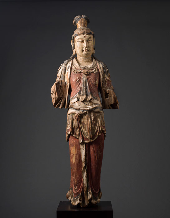 One of a pair of polychrome and gilt wood Bodhisattvas