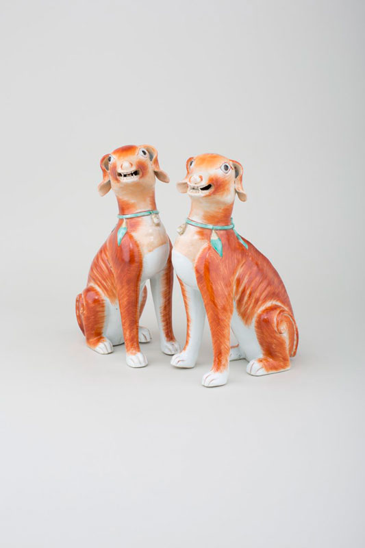 Pair of Iron-red Seated Open-mouthed Hounds