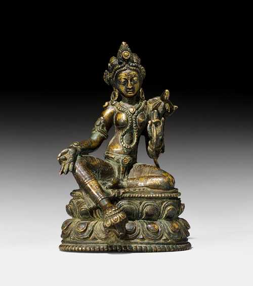 A small bronze figure of the Green Tara
