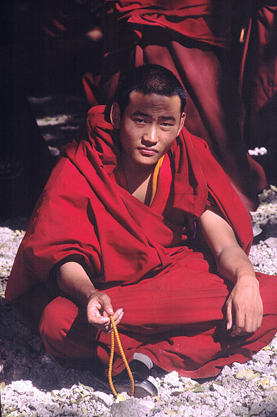 A Lama with pray beads