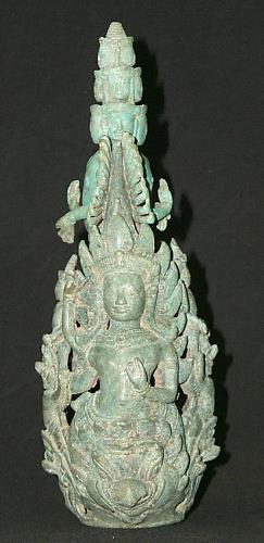 An unusual Janus Khmer bronze 20-armed figure, mounted as a battle standard with attendant figures