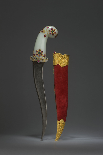 A gem-set and gold-inlaid jade-hilted dagger