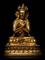 A gilt-bronze figure of Vajradhara