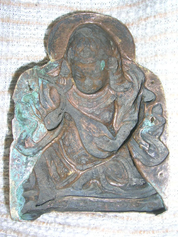 A copper repouss� fire gilded figure of a Lokhapala