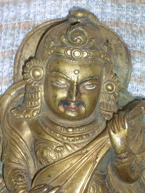 A copper repouss� fire gilded figure of a Lokhapala