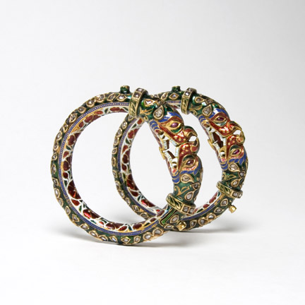 A pair of rigid bangles with makara head