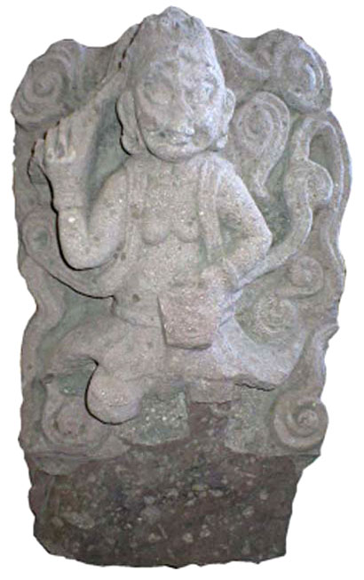 Ancient stone statue of a deity