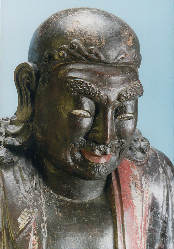 A Carved, lacquered wooden image of a Luohan