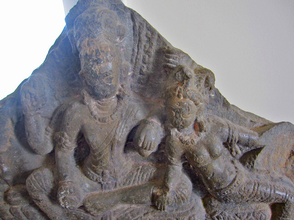 A carved stone stele, depicting Uma-Mahesvara