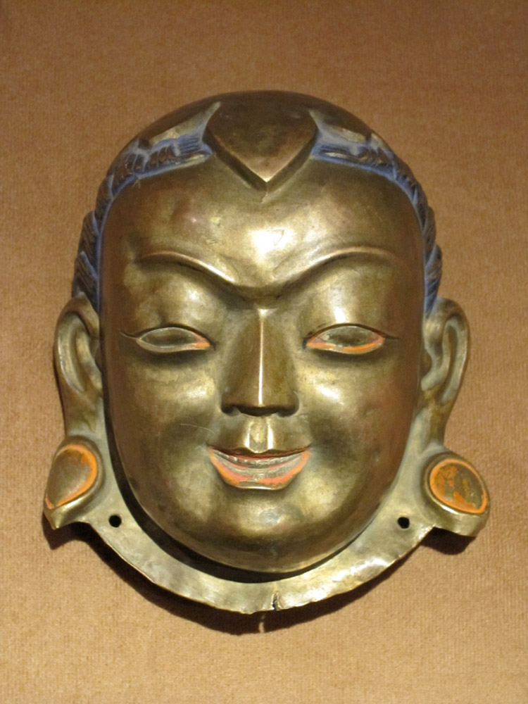 A repousse copper head of Arhat Ajita