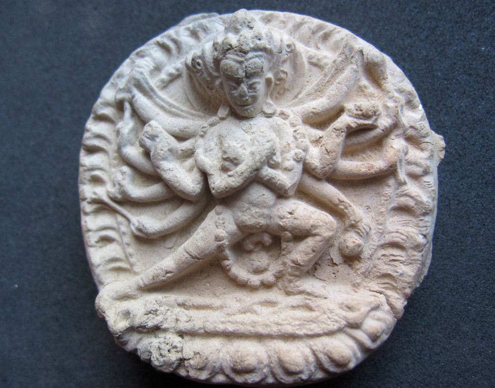 A Terracotta TsaTsa (votive tablet) depicting Cakrasamvara