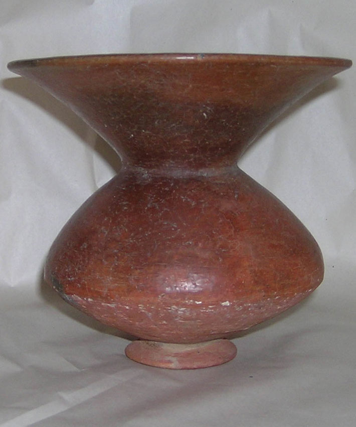 An earthenware vessel with flared mouth
