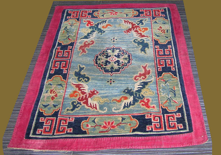 An upper saddle rug, wool warp and wool wefts