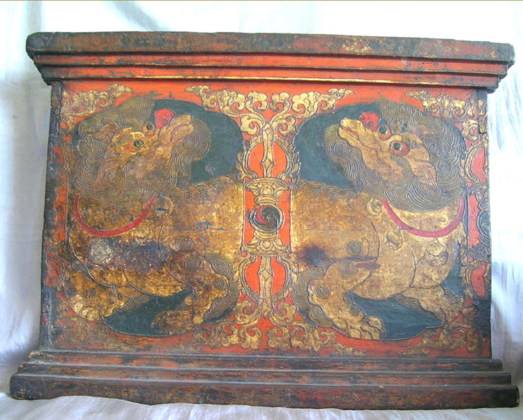 A painted Buddhist altar panel depicting Snow Lions