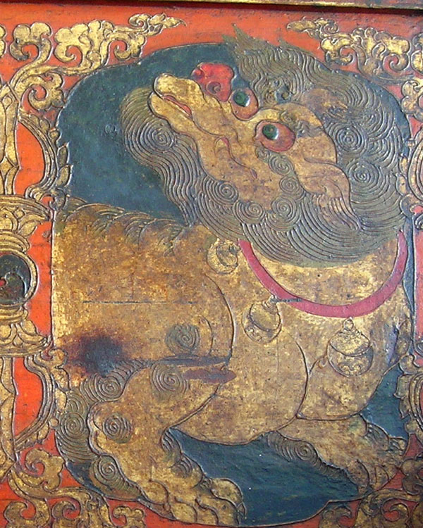 A painted Buddhist altar panel depicting Snow Lions