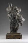 Black Lingbi limestone<br>on a wooden stand