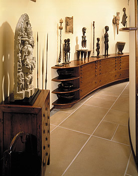 Frank Lloyd Wright's original cabinetry designs set off the artifacts of Xanadu Gallery in San Francisco.