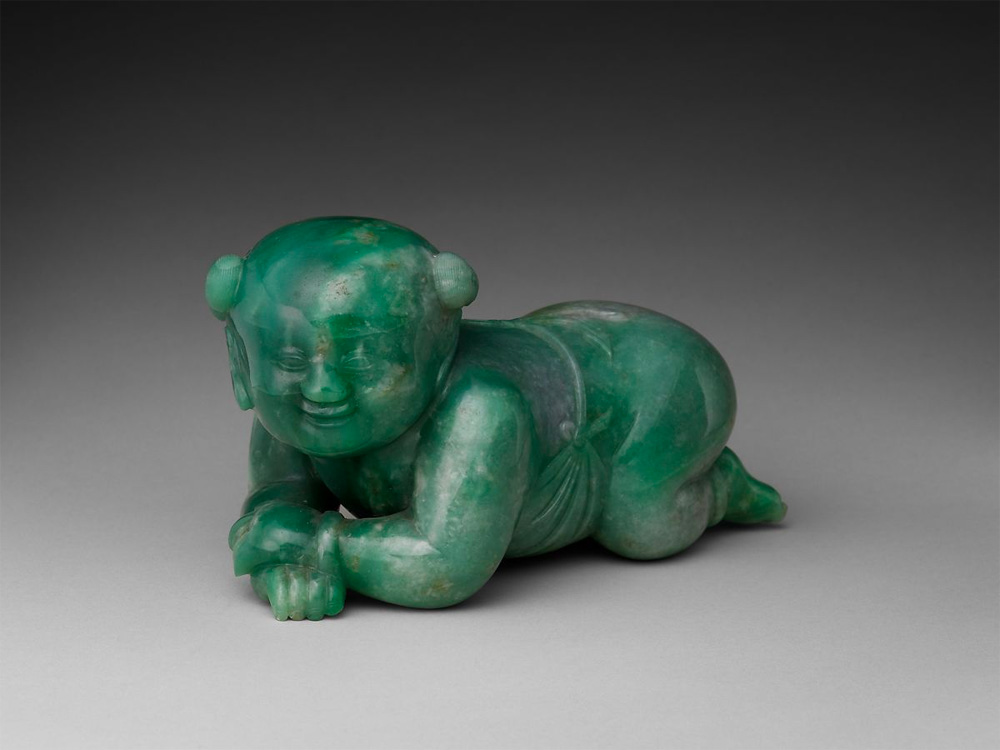 Pillow in the shape of an infant boy