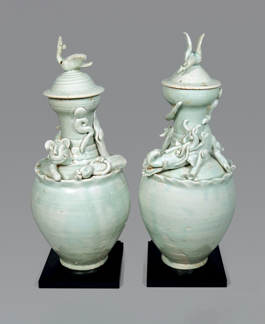Fine and Rare Pair of Chinese Qingbai Glazed Vases and Covers