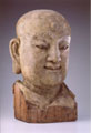 A wood head of a Louhan