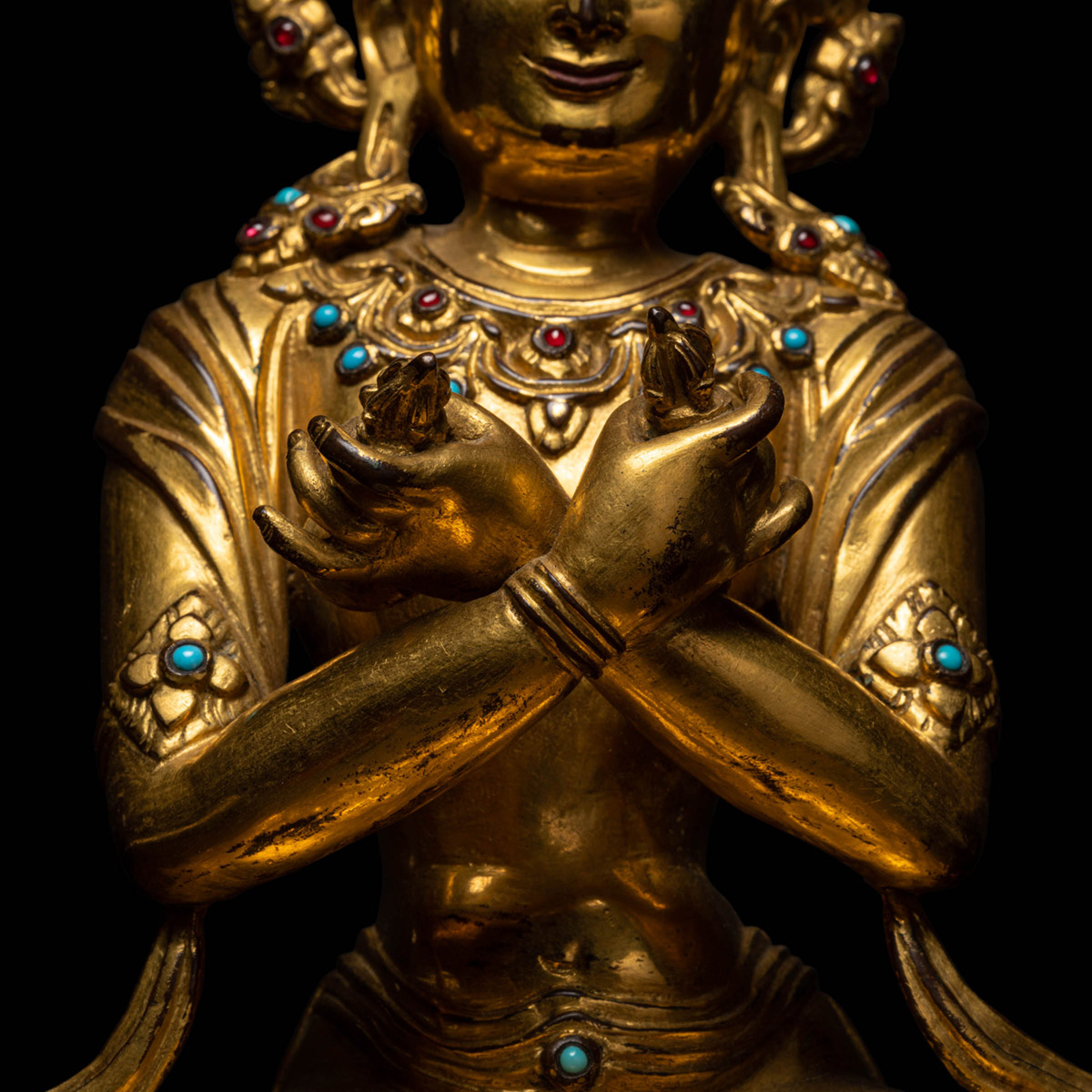 A gilt-bronze figure of Vajradhara