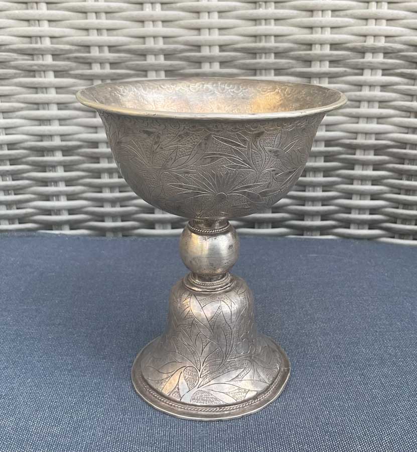 A silver butter lamp