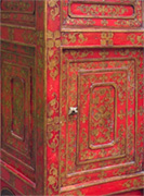 A square wooden cupboard with one door