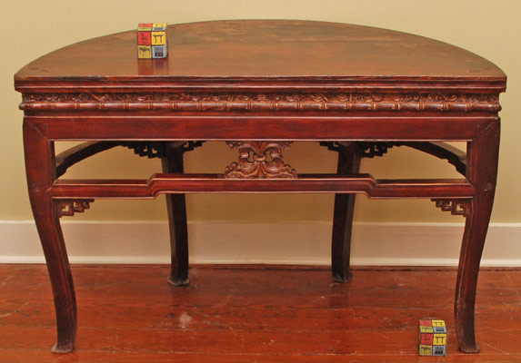 Two demilune tables which join together to form circular table