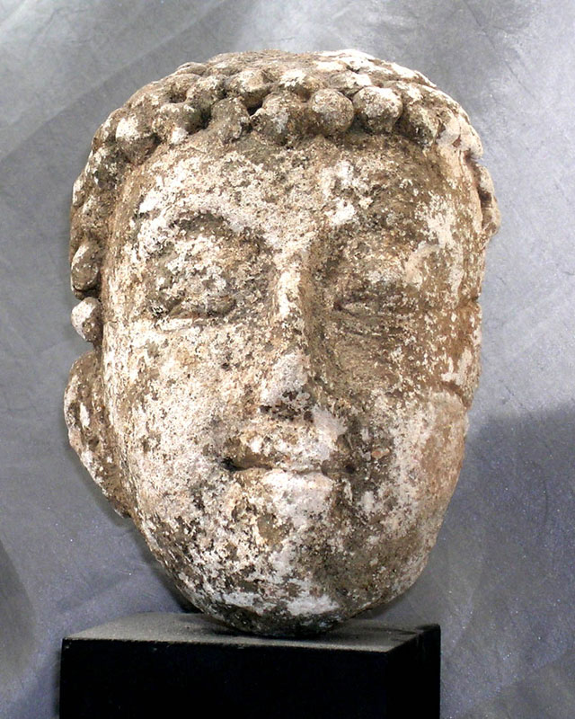 Stucco head of the Buddha