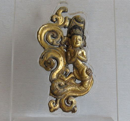 A fire gilt copper repousse Naga